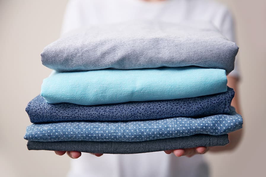 Roupas passadas e dobradas