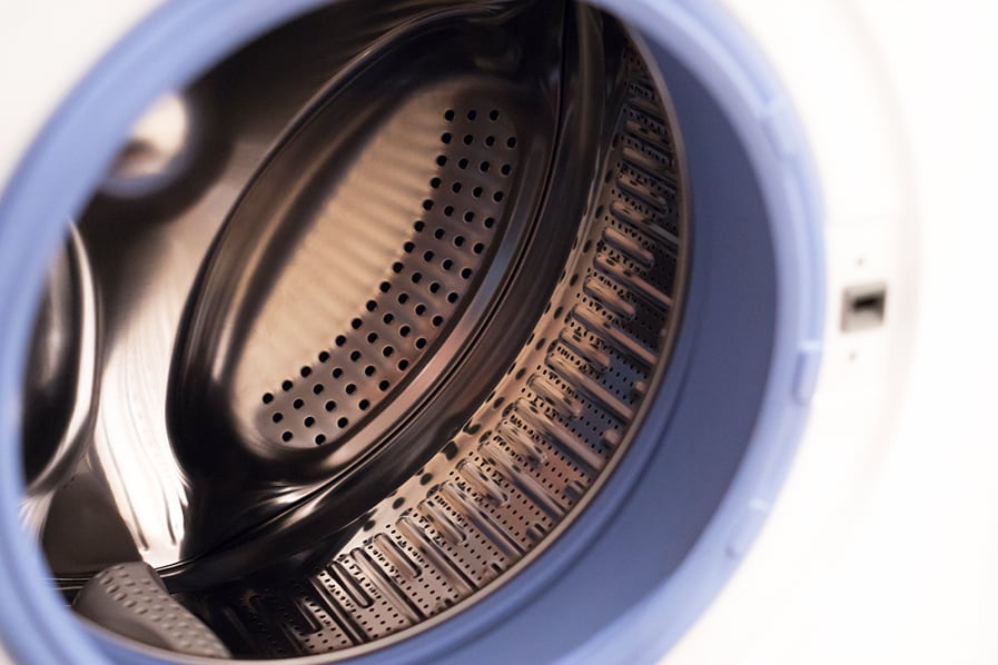 Detalhes internos de máquina de lavar com abertura frontal